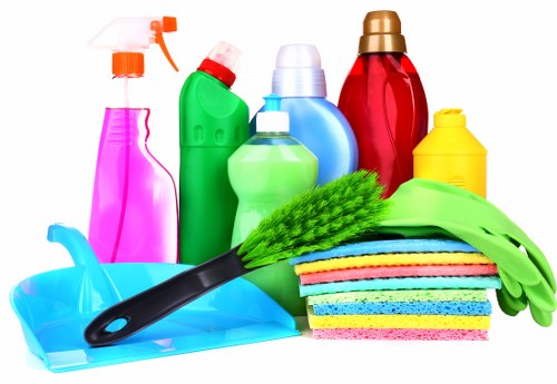 Carpet cleaning team preparing safe equipment and work area